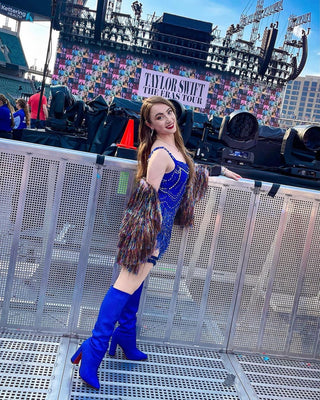blue fringe dress taylor swift @TaylorSwift wore for The Eras Tour in Los Angeles a custom #ZMCouture midnight blue bodysuit adorned with shimmering crystal embellishments, cascading intricate beaded fringes, and accompanied by a